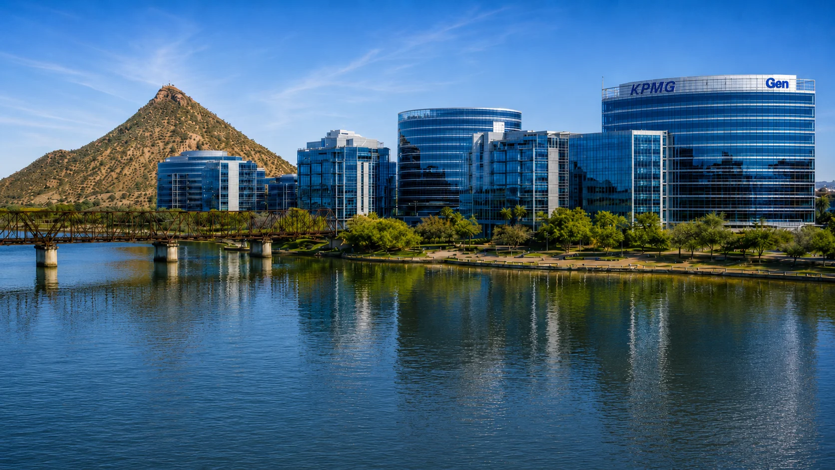Silverado Holdings. Waterfront commercial office towers beside a desert mountain and lake in metropolitan Arizona.
